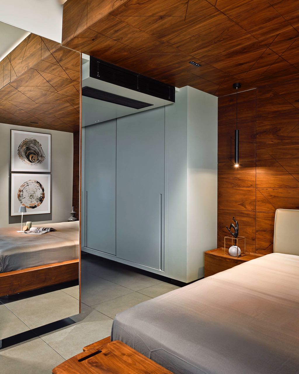 MA HOME bedroom with full-height mirror, frosted glass wardrobe and teak panelling