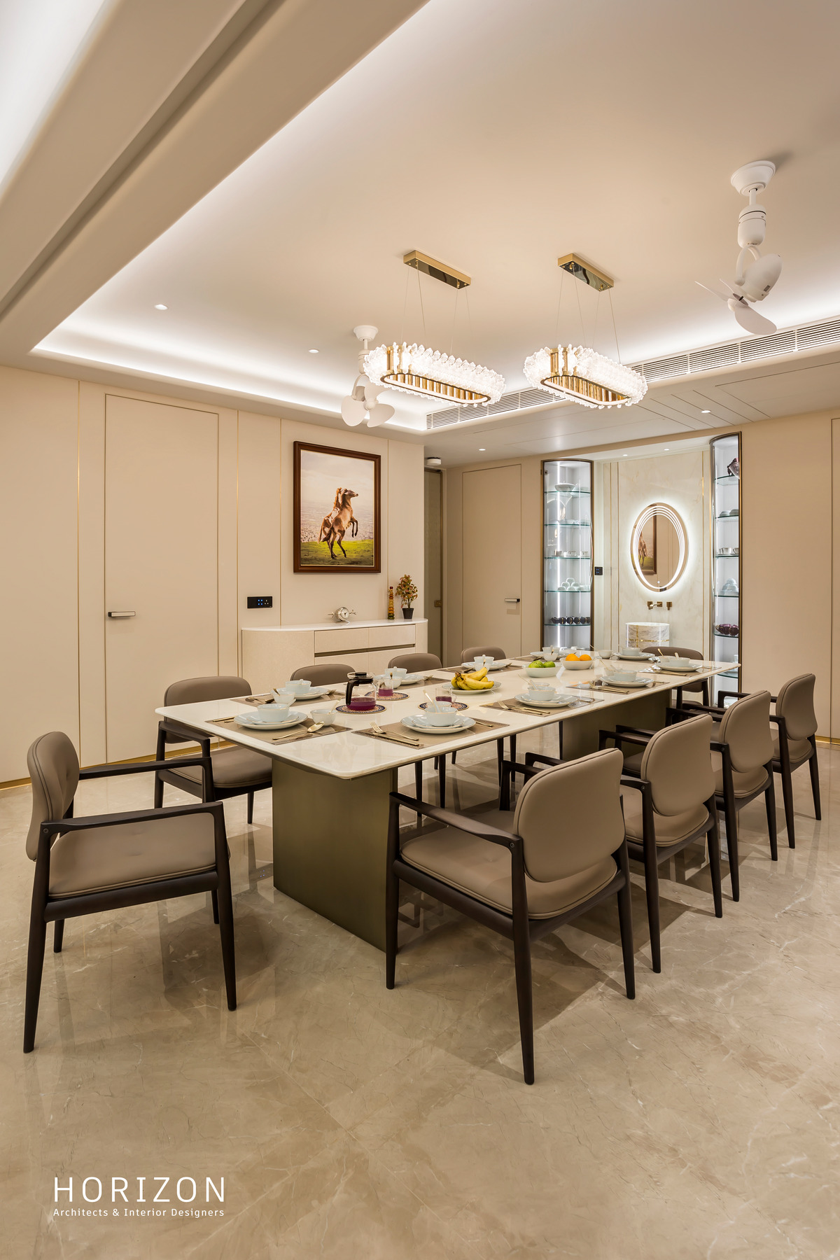 RAHUL BHAI HOME dining table set for a meal under two crystal pendants