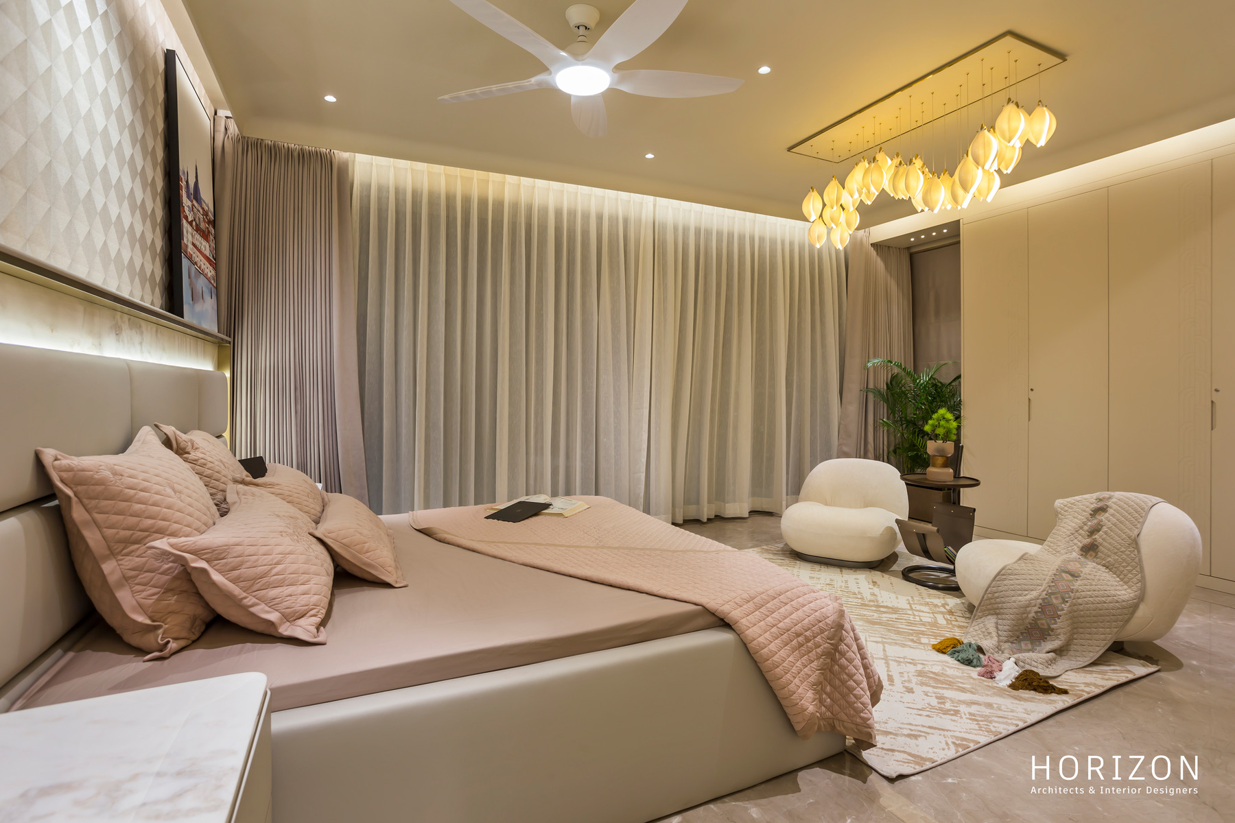 RAHUL BHAI HOME guest bedroom with bubble chandelier, boucle chairs and floor-to-ceiling curtains