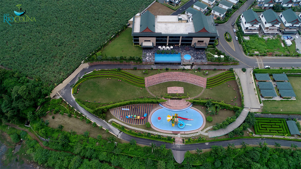 Aerial view of the clubhouse, pool, amphitheatre, kids' pool and maze