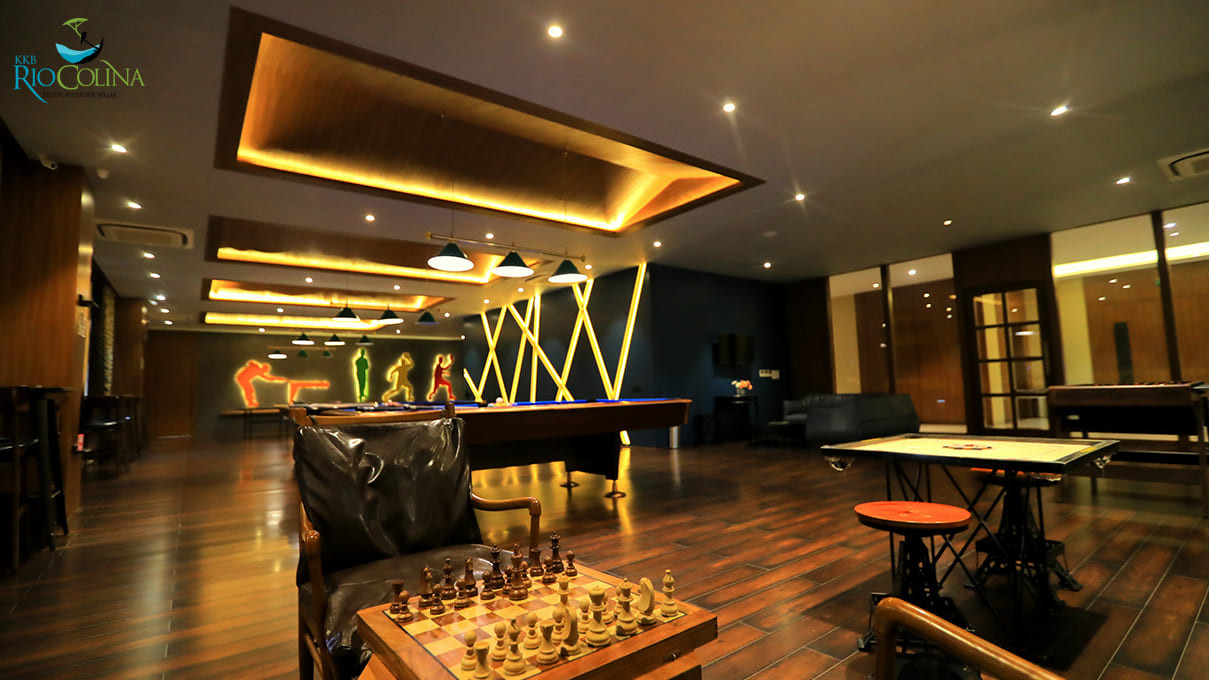Games room with chess board, carrom and pool tables