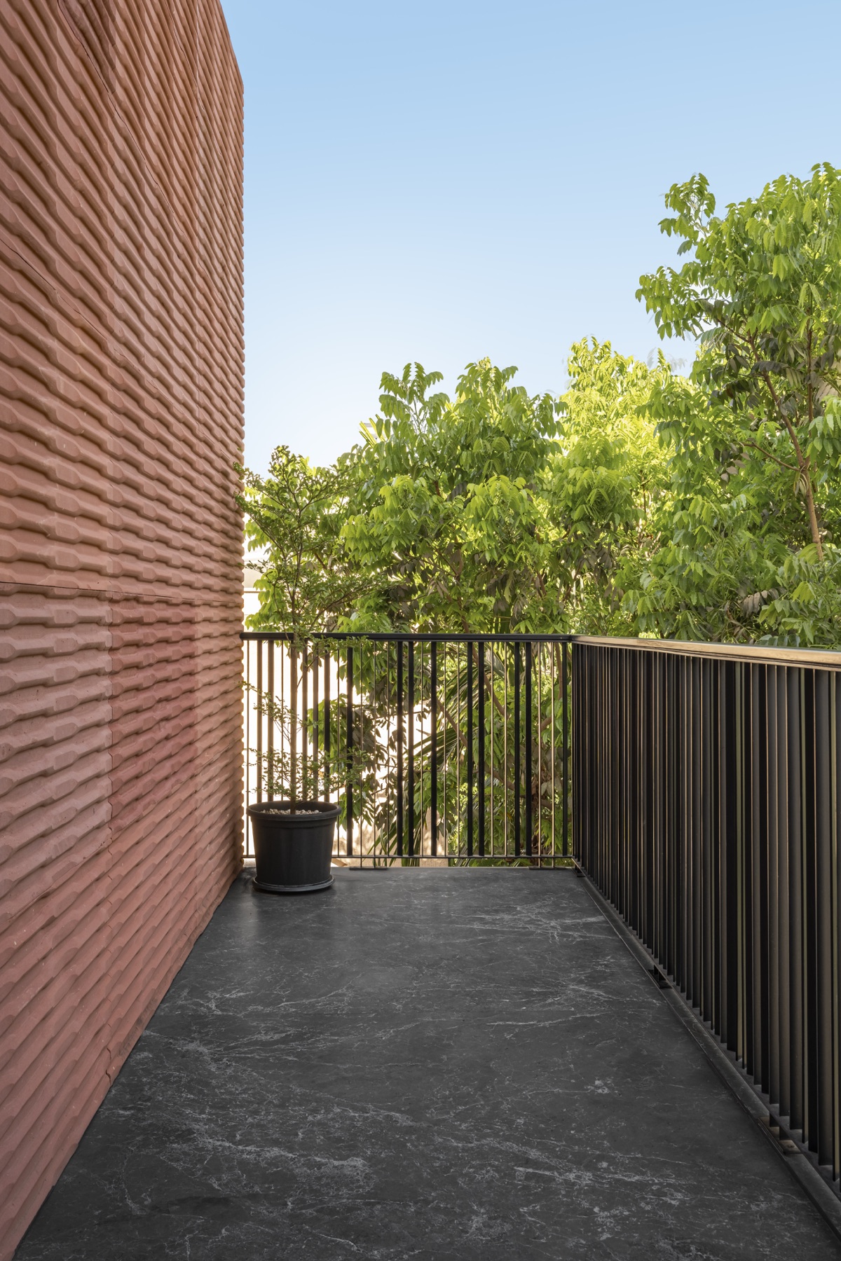 SHRI HOME balcony and terracotta wall