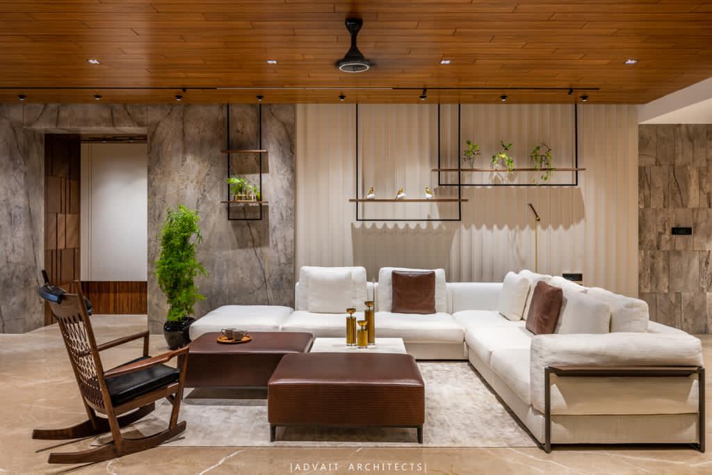 VILLASHBHAI HOME seating group with white sectional, timber rocking chair and leather ottoman